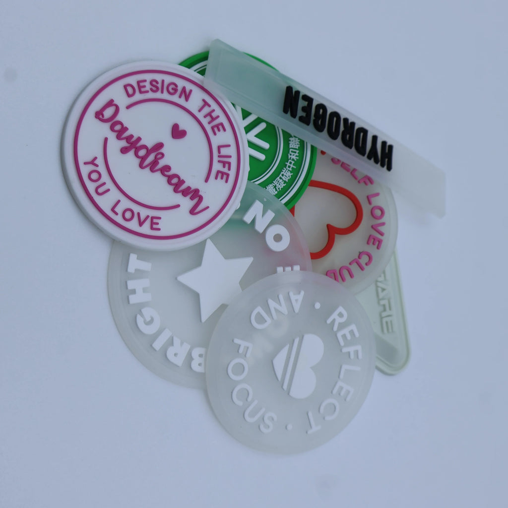 Custom 3D Embossed Silicone Clothing Labels | PVC Rubber Labels | 100 MOQ