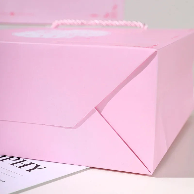 Custom 210gsm Recycled Pink Paper Gift Bags | MOQ 48, Offset Print, Twisted Handles