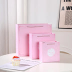 Custom 210gsm Recycled Pink Paper Gift Bags | MOQ 48, Offset Print, Twisted Handles