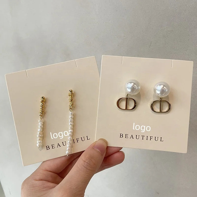 Custom Jewelry Display Cards & Hang Tags with Logo — Paper, Kraft, Foil Stamping
